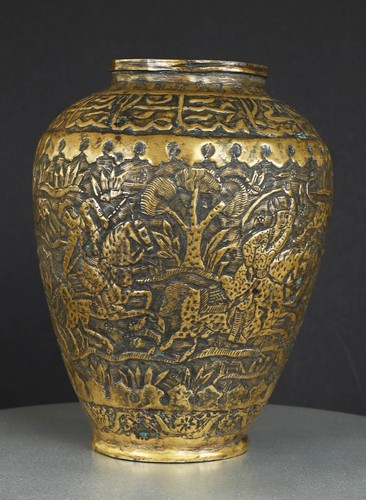 Decorated brass vessel with
